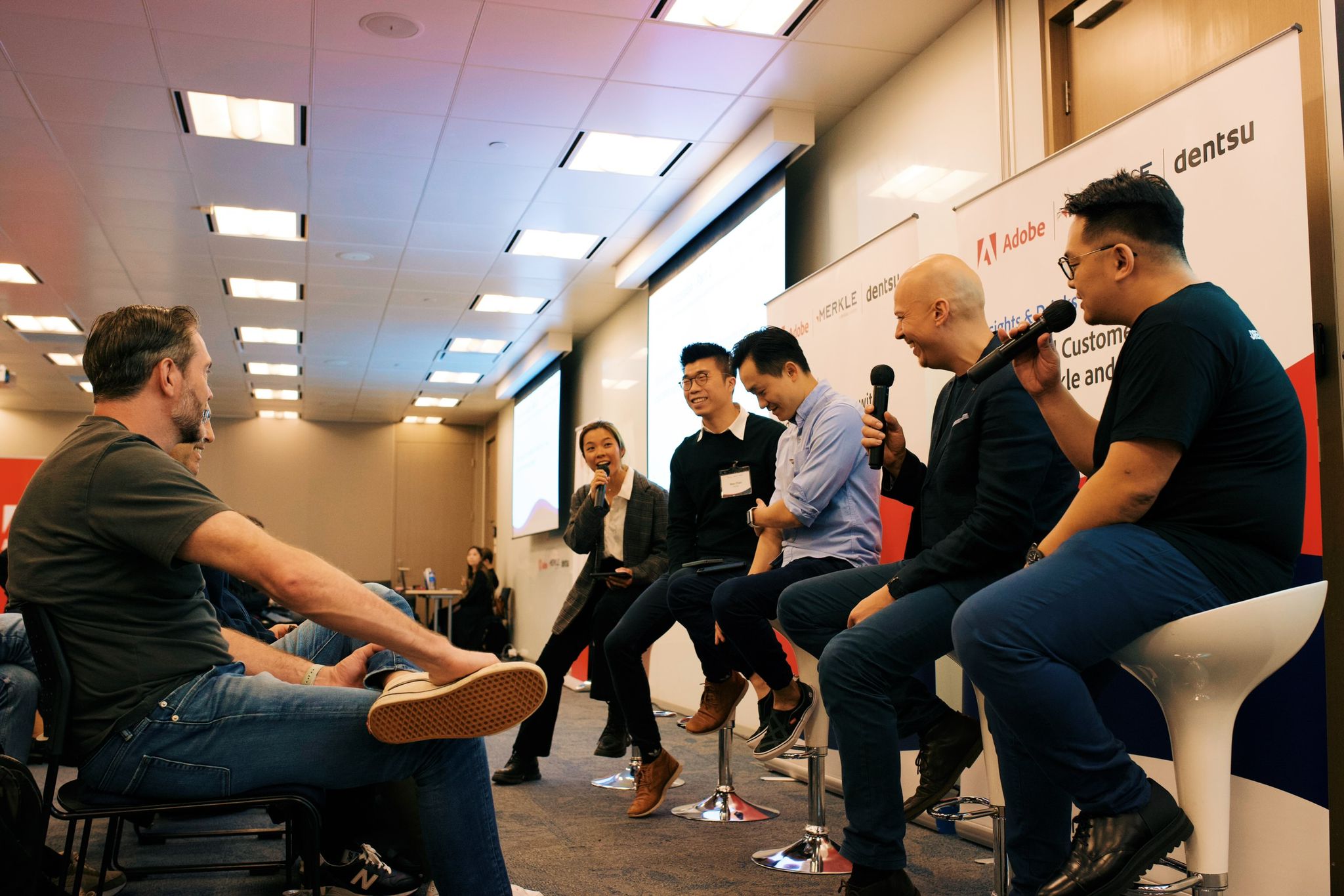 Consulting team collaborating around a table in a modern office.