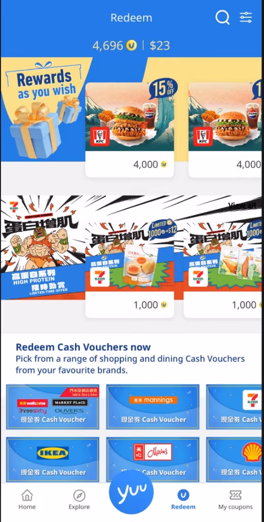 yuu Redeem screen showing 4,696 points valued at $23 and a KFC meal for 4,000 points.